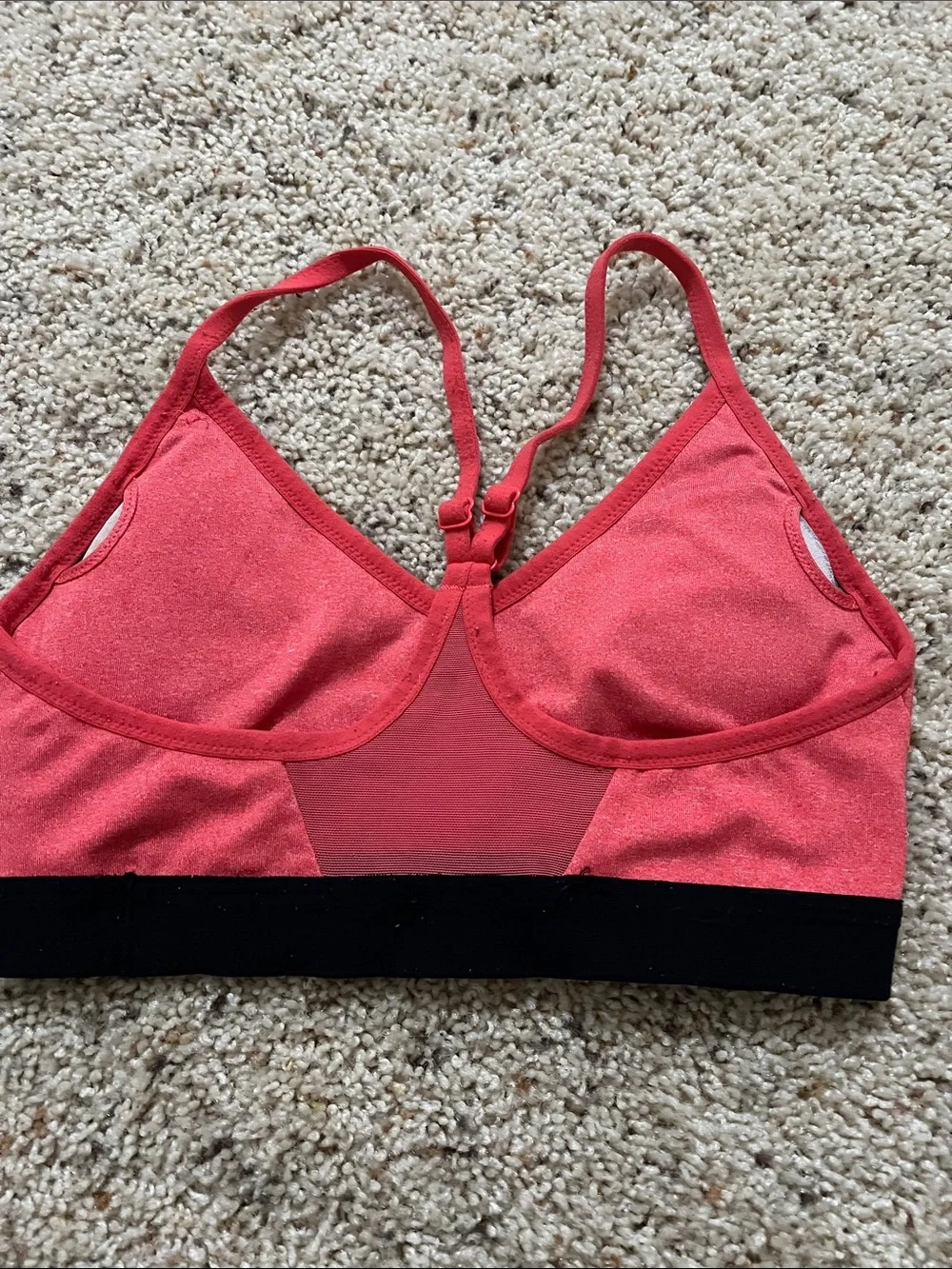 Nike Coral Pink V‑Neck Sports Bra with Black Band